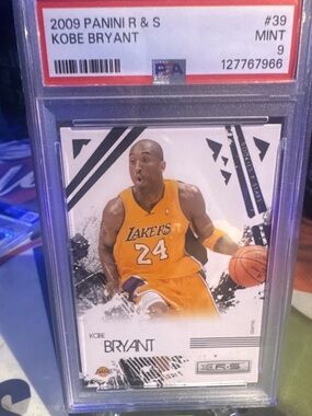 Panini Kobe Bryant Lakers mint 9 Grade Yellow and Purple Jersey Card